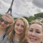 Kimberly and her daughters in front of the Eiffel Tower: Women World Cup Trip Report episode