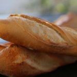 Baguettes on a table: Bread in France episode