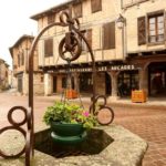 Water well and city square in the town of Castelnau de Montmiral: bastides in the southwest of France episode