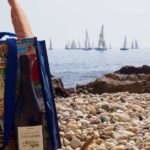 Bag with French writing on it, a baguette and a bottle of wine. Are you a proper Francophile episode.