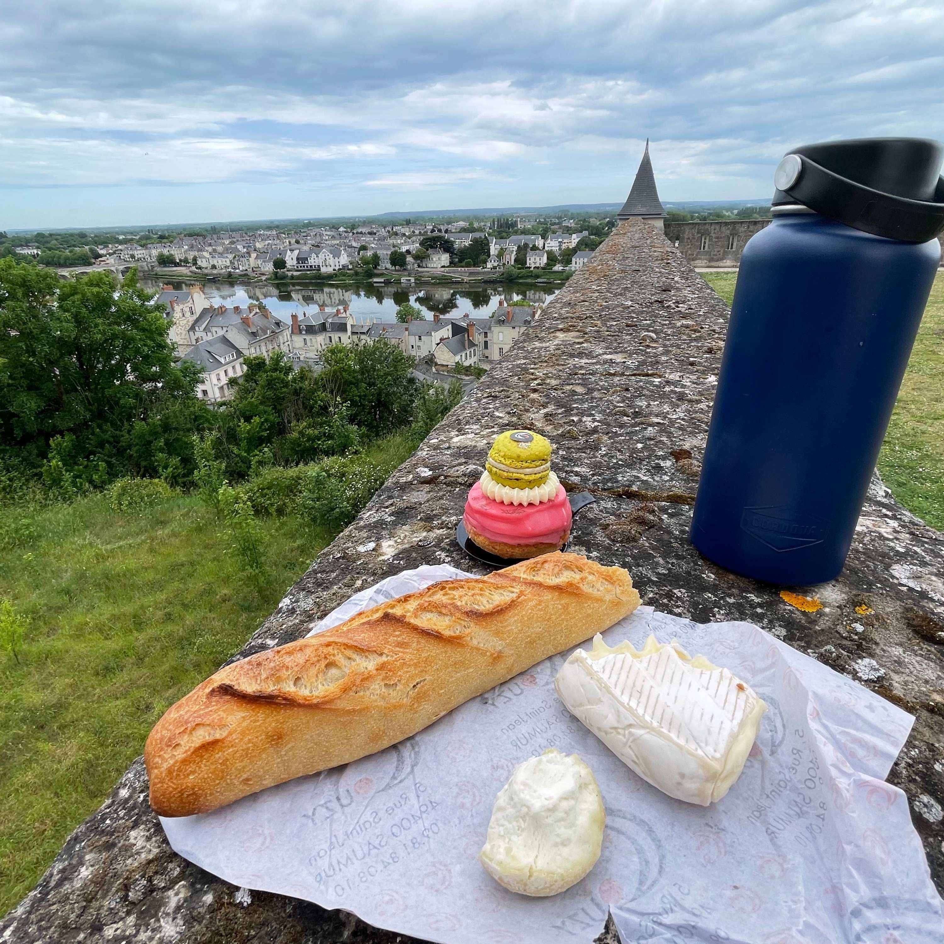 A picnic of cheese, bread, pastry in a historical site in France: France on a student budget episode