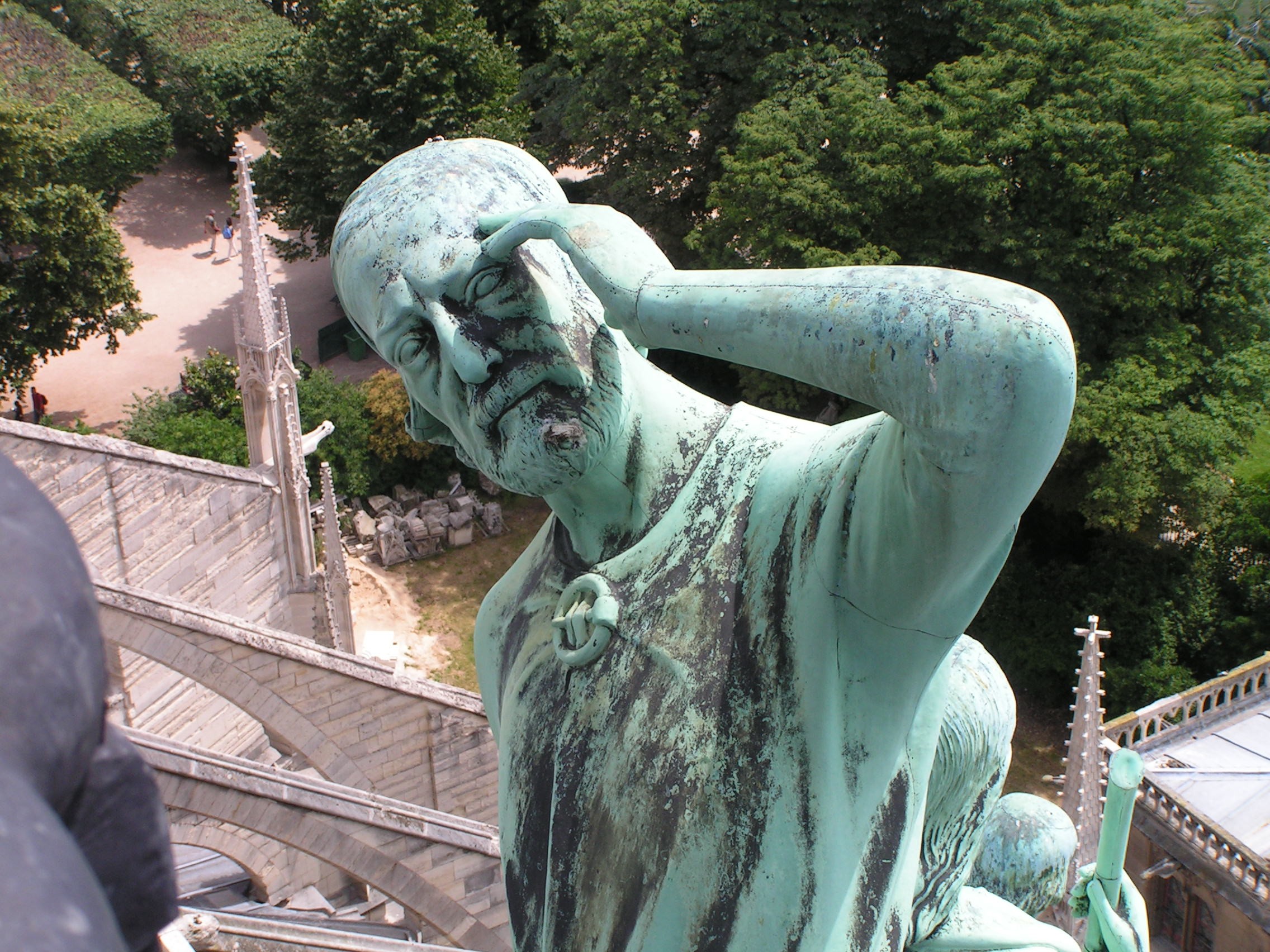 Apostle in the likeness of Viollet-le-Duc on Notre Dame. Photo Amanda Harmonia.